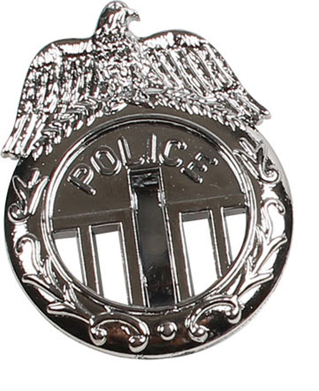 Håndjern i metal og politi badge