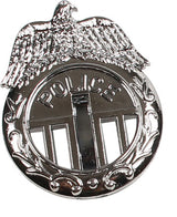 Håndjern i metal og politi badge