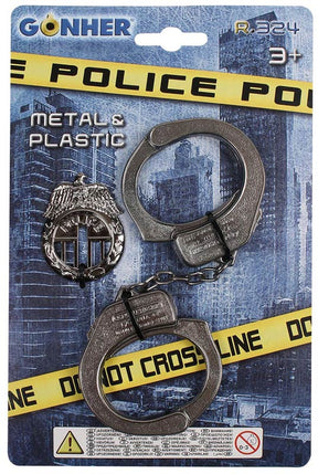 Håndjern i metal og politi badge