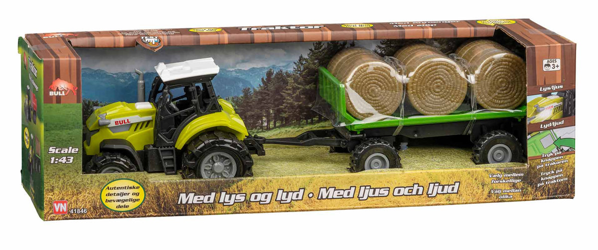 Bull traktor med halmballer