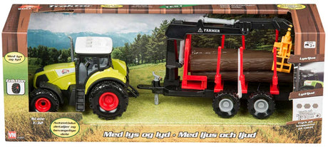 Bull traktor med anhænger til træstammer